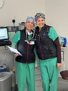 Lisa Solder (left) and Laura Real (right) pose for a photo at their hospital.
