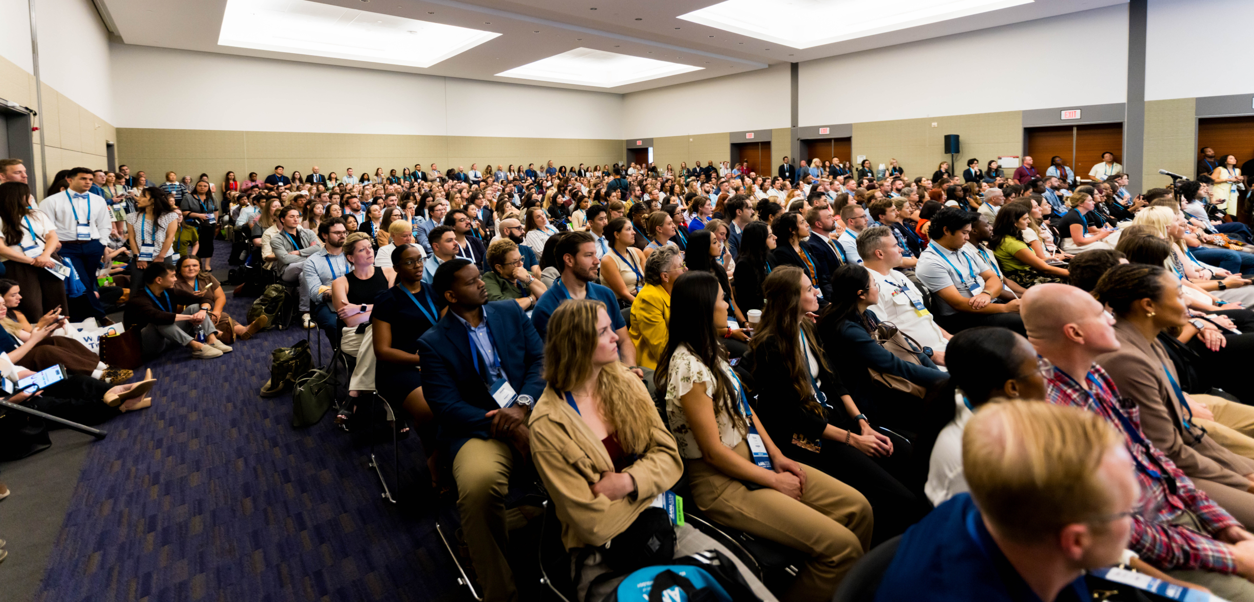 Attendees fill a session room, with others standing along the walls, at the 2026 AANA Annual Congress.