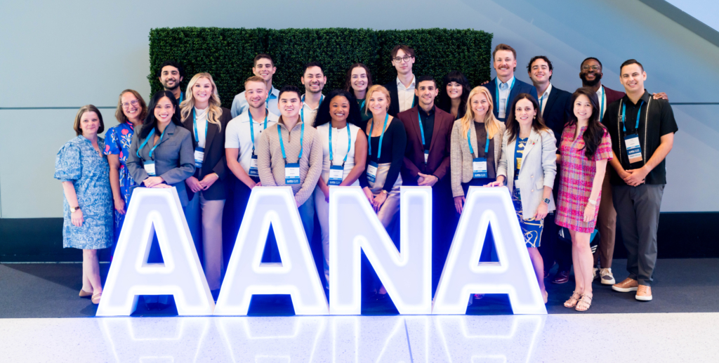 Attendees pose behind illuminated AANA letters at the 2026 AANA Annual Congress in Boston.
